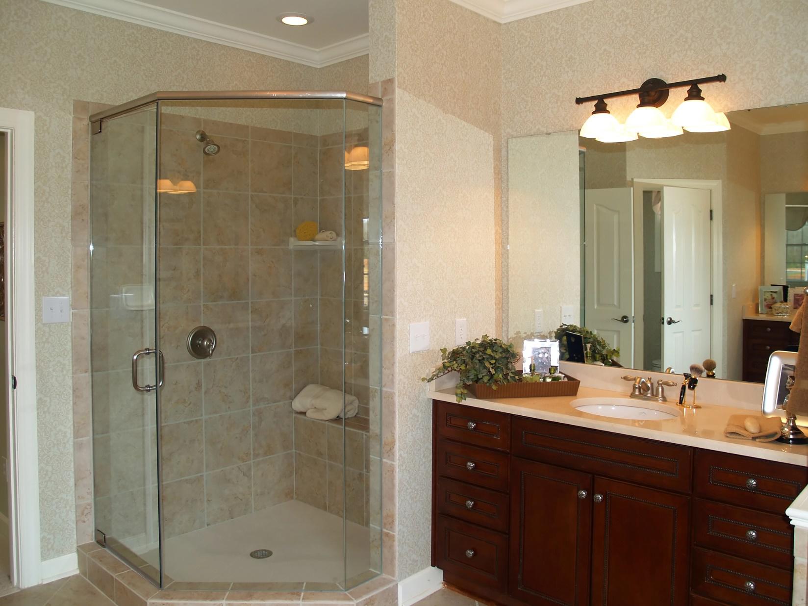 A glass shower adds beauty and elegance to a bathroom