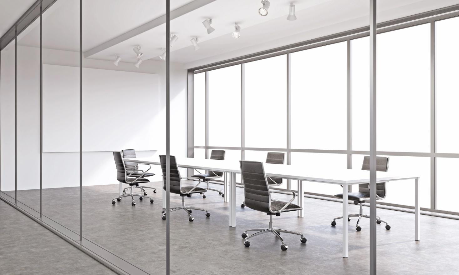 Meeting room in an office with panels of tempered glass